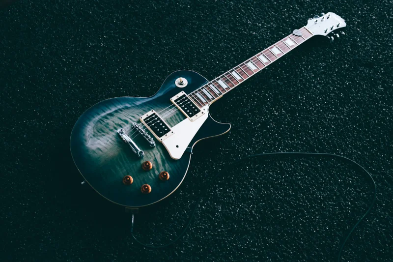 Electric guitar with a dark blue body